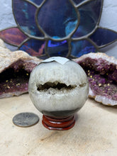Load image into Gallery viewer, Banded Black Agate Spheres
