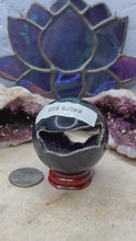 Load and play video in Gallery viewer, Banded Black Agate Spheres
