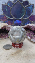 Load and play video in Gallery viewer, Banded Black Agate Spheres
