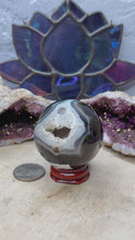 Load and play video in Gallery viewer, Banded Black Agate Spheres
