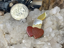 Load image into Gallery viewer, Candle with Goldstone and Agate Hearts
